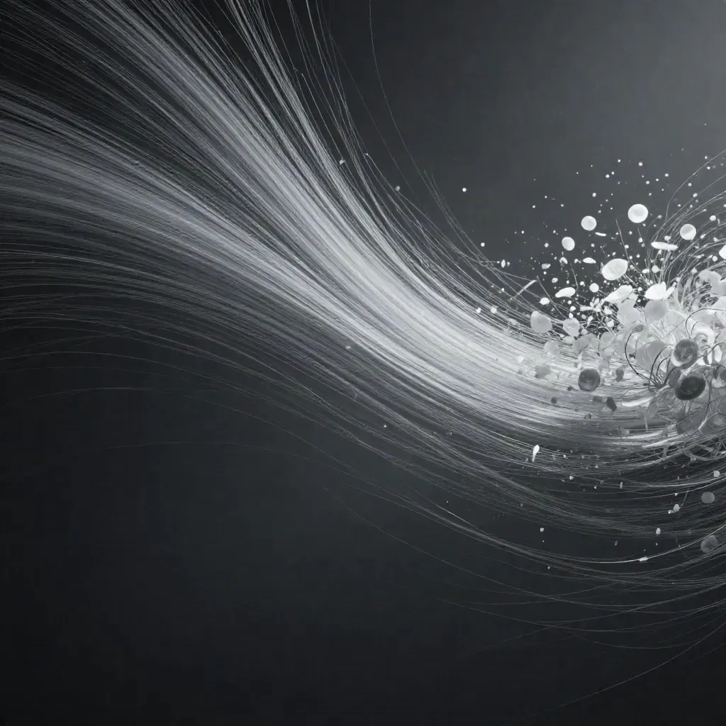 Silver filaments bloom in graphite space with open lower-left copy area.
